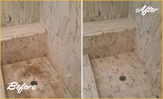 Before and After Picture of a Dirty Neptune Beach Marble Shower Cleaned to Eliminate Dark Stains