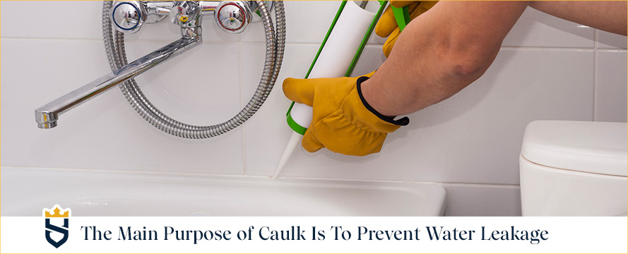 Picture of a Professional Caulking a Bathroom's Joint