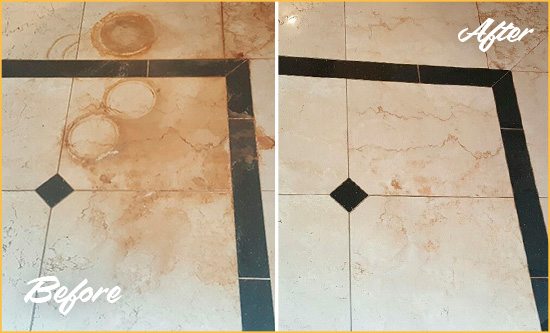 Before and After Picture of a Duval Hard Surface Restoration Service on a Marble Floor to Eliminate Rust Stains