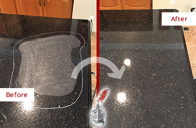 Before and After Picture of a Black Granite Countertop with Etching